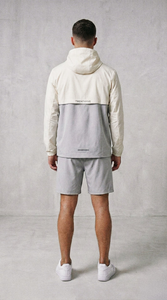 WINDBREAKER CREAM/GREY