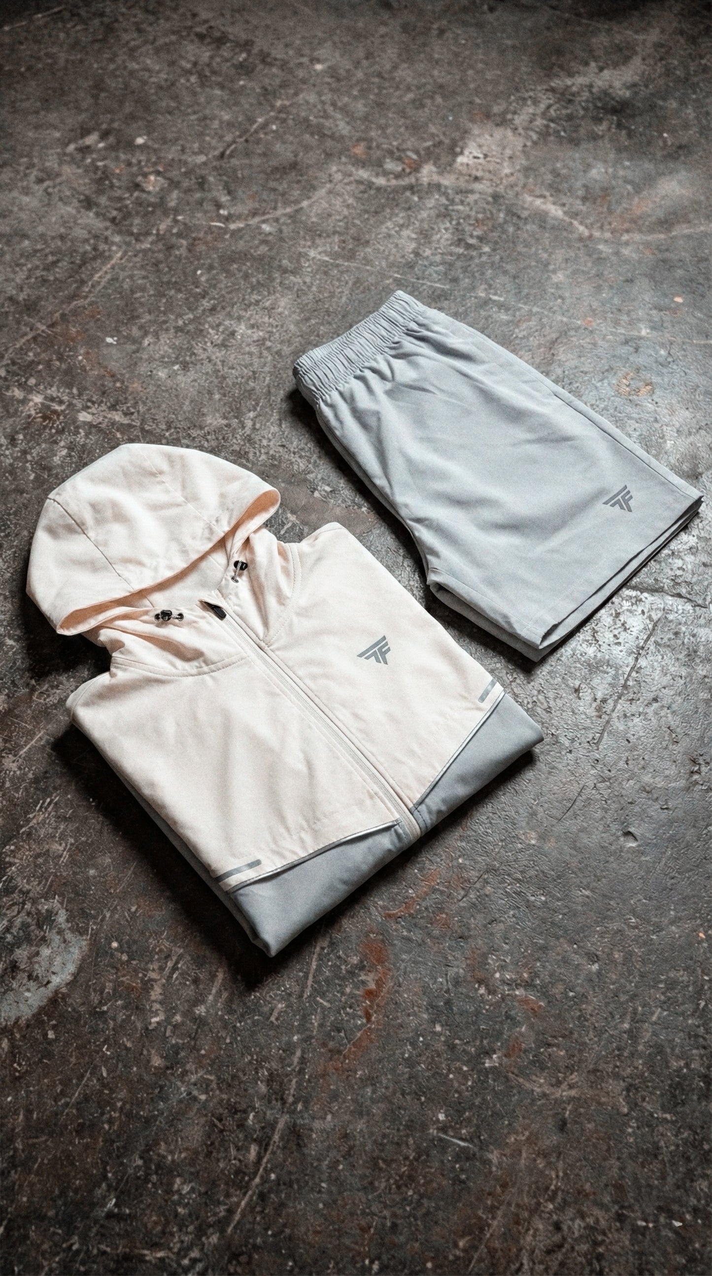 WINDBREAKER CREAM/GREY